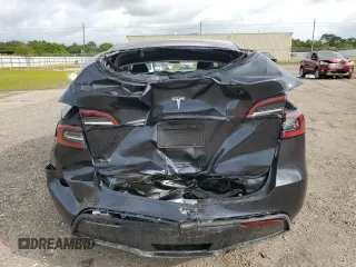 2024 Tesla Model Y с VIN 7SAYGDED4RA329638, выставлен на аукционе Copart как лот 54562525 с пробегом 8 606 миль миль и Списание • Salvage title. История ставок и продаж доступна на DreamBid. Изображение 6.