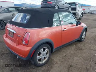 2006 MINI Convertible with VIN WMWRF33546TF65857, listed as a IAAI auction lot 41814032 with 91,736 mi miles and . Bid and sale history available at DreamBid. Image 4.