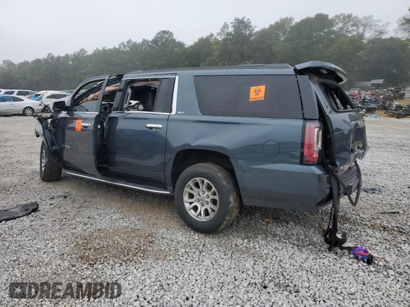 2019 GMC Yukon XL SLT with VIN 1GKS1GKC3KR392190, listed as a Copart auction lot 86548064 with 0 mi miles and Salvage Title. Bid and sale history available at carsss.com. Image 2.