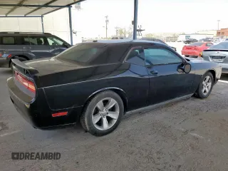 2012 Dodge Challenger SXT Plus z VIN 2C3CDYAG4CH137801, wystawiony jako Copart lot #57758515 z przebiegiem Nie podano mil oraz Czysty tytuł • Clean title. Historia ofert i sprzedaży dostępna na DreamBid. Obrazek 3.