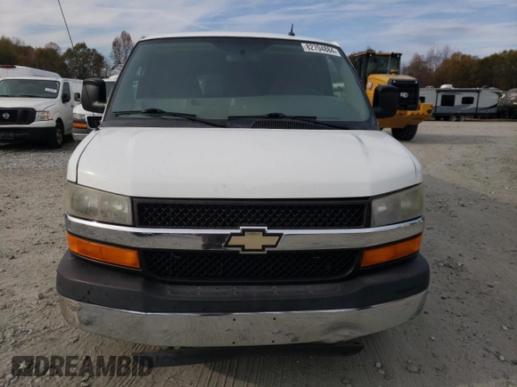 2014 Chevrolet Express Passenger LT with VIN 1GAZG1FG2E1202457, listed as a Copart auction lot 82704884 with 142,982 mi miles and Salvage title. Bid and sale history available at DreamBid. Image 5.