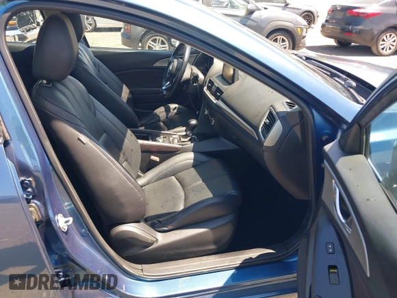 2018 Mazda 3 Touring z VIN 3MZBN1L38JM185142, wystawiony jako IAAI lot #42004450 z przebiegiem 172 096 mil mil oraz . Historia ofert i sprzedaży dostępna na DreamBid. Obrazek 5.