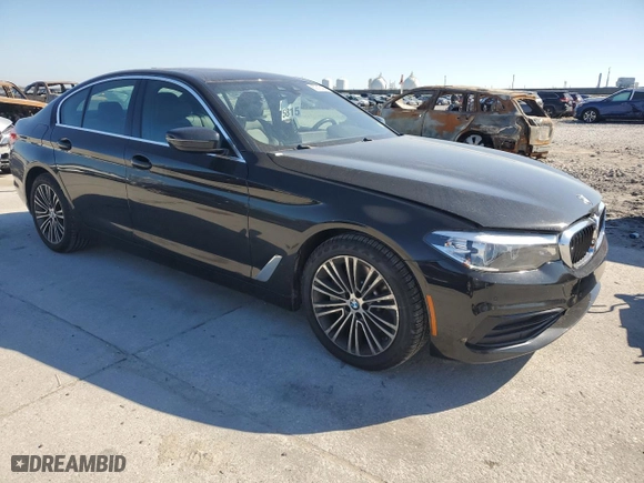 2019 BMW 5 Series 530i with VIN WBAJA5C57KG900892, listed as a Copart auction lot 82915404 with 79,037 mi miles and Salvage Title. Bid and sale history available at carsss.com. Image 4.