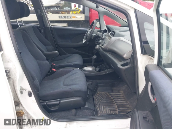 2011 Honda Fit Sport z VIN JHMGE8H51BC016707, wystawiony jako IAAI lot #42341893 z przebiegiem 326 759 mil mil oraz . Historia ofert i sprzedaży dostępna na DreamBid. Obrazek 5.