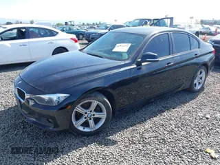 2013 BMW 3 Series 328i xDrive with VIN WBA3B5G58DNS02841, listed as a IAAI auction lot 41924431 with 106,981 mi miles. Bid and sale history available at carsss.com. Image 2.