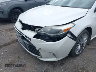 2016 Toyota Avalon Limited with VIN 4T1BK1EB6GU201211, listed as a IAAI auction lot 41599051 with 211,533 mi miles and . Bid and sale history available at carsss.com. Image 6.