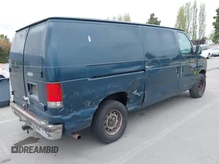 1998 Ford Econoline Cargo with VIN 1FTRE1426WHB06957, listed as a IAAI auction lot 42071927 with 99,999 mi miles. Bid and sale history available at carsss.com. Image 4.