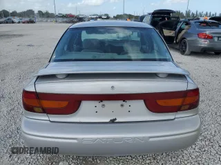 2000 Saturn SL z VIN 1G8ZK5276YZ224500, wystawiony jako Copart lot #45083945 z przebiegiem 130 766 mil mil oraz Szkoda całkowita • Salvage title. Historia ofert i sprzedaży dostępna na DreamBid. Obrazek 6.