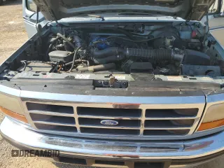 1996 Ford Bronco Custom with VIN 1FMEU15H2TLA98333, listed as a Copart auction lot 67065144 with 347,019 mi miles and Salvage Title. Bid and sale history available at carsss.com. Image 12.