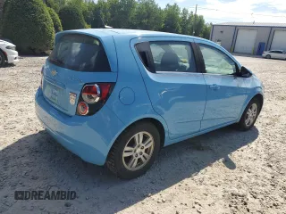 2014 Chevrolet Sonic LT with VIN 1G1JC6SBXE4155113, listed as a Copart auction lot 60866464 with 99,695 mi miles and Salvage Title. Bid and sale history available at carsss.com. Image 3.