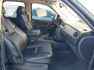 2012 Chevrolet Tahoe LT with VIN 1GNSKBE09CR295291, listed as a IAAI auction lot 41261810 with 133,400 mi miles and . Bid and sale history available at DreamBid. Image 5.