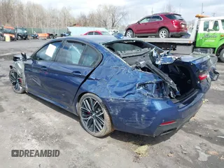 2022 BMW 5 Series M550i xDrive with VIN WBA13BK08NCJ54124, listed as a IAAI auction lot 41977413 with Not provided miles and . Bid and sale history available at DreamBid. Image 3.