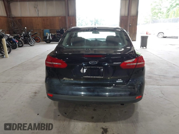 2018 Ford Focus SE with VIN 1FADP3FE8JL209560, listed as a IAAI auction lot 42707236 with 166,017 mi miles and . Bid and sale history available at DreamBid. Image 16.