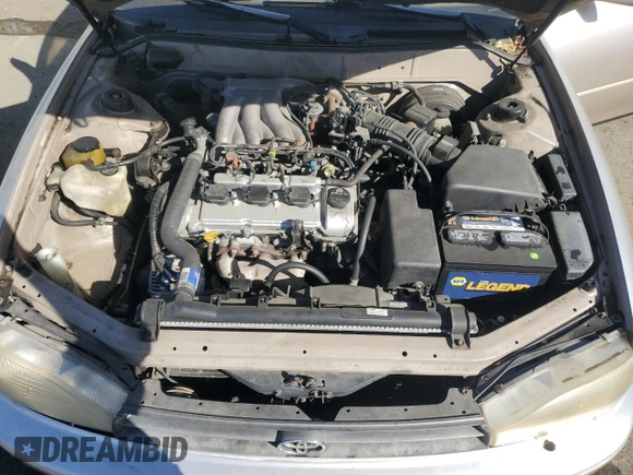 1994 Toyota Camry LE z VIN JT2GK12EXR0070117, wystawiony jako Copart lot #75997244 z przebiegiem 185 759 mil mil oraz Czysty tytuł • Clean title. Historia ofert i sprzedaży dostępna na DreamBid. Obrazek 11.