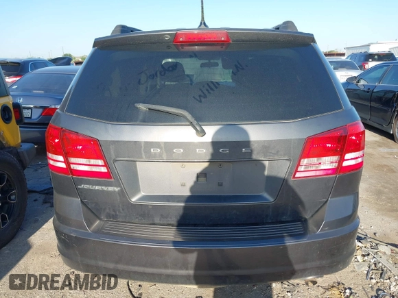 2017 Dodge Journey SE z VIN 3C4PDCAB9HT551840, wystawiony jako IAAI lot #41977338 z przebiegiem 202 856 mil mil oraz . Historia ofert i sprzedaży dostępna na DreamBid. Obrazek 16.