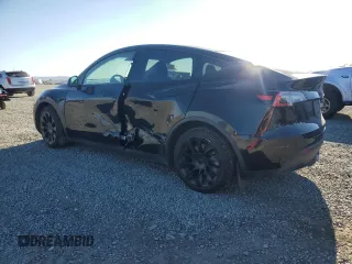 2021 Tesla Model Y Long Range z VIN 5YJYGDEE3MF092495, wystawiony jako Copart lot #50664225 z przebiegiem 72 947 mil mil oraz Szkoda całkowita • Salvage title. Historia ofert i sprzedaży dostępna na DreamBid. Obrazek 2.