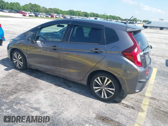 2015 Honda Fit EX-L z VIN 3HGGK5H89FM730013, wystawiony jako IAAI lot #42673309 z przebiegiem 142 660 mil mil oraz . Historia ofert i sprzedaży dostępna na DreamBid. Obrazek 3.