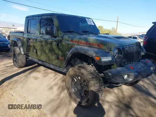 2021 Jeep Gladiator Mojave with VIN 1C6JJTEG8ML606876, listed as a IAAI auction lot 41632052 with 30,255 mi miles and . Bid and sale history available at DreamBid. Image 1.