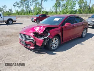 2015 Ford Fusion SE with VIN 1FA6P0H73F5123218, listed as a IAAI auction lot 42010665 with 185,309 mi miles. Bid and sale history available at carsss.com. Image 2.