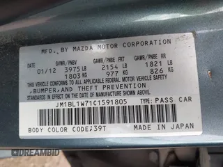 2012 Mazda 3 i Grand Touring with VIN JM1BL1W71C1591805, listed as a IAAI auction lot 42169797 with Not Provided miles and . Bid and sale history available at DreamBid. Image 9.