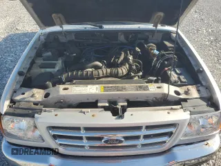 2002 Ford Ranger XL with VIN 1FTYR14U72TA19237, listed as a Copart auction lot 62276095 with 74,517 mi miles and Salvage title. Bid and sale history available at DreamBid. Image 11.