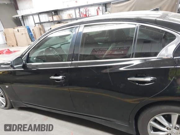 2014 Infiniti Q50 Premium with VIN JN1BV7AP6EM676289, listed as a IAAI auction lot 42304661 with 117,905 mi miles and . Bid and sale history available at DreamBid. Image 14.
