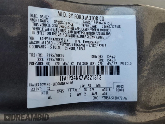 2007 Ford Focus S z VIN 1FAFP34NX7W321313, wystawiony jako Copart lot #43158235 z przebiegiem 57 299 mil mil oraz Szkoda całkowita • Salvage title. Historia ofert i sprzedaży dostępna na DreamBid. Obrazek 14.