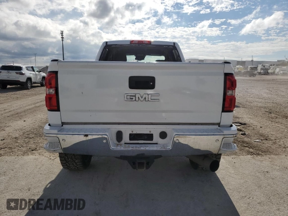 2018 GMC Sierra 2500HD SLT with VIN 1GT12TEYXJF156687, listed as a Copart auction lot 86760944 with 79,387 mi miles and Salvage Title. Bid and sale history available at carsss.com. Image 6.
