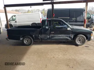 1995 Nissan Frontier XE with VIN 1N6SD16S8SC409695, listed as a IAAI auction lot 42114494 with 159,792 mi miles and . Bid and sale history available at DreamBid. Image 13.