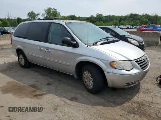 2007 Chrysler Town & Country LX z VIN 2A4GP44RX7R235204, wystawiony jako Copart lot #60727205 z przebiegiem 102 970 mil mil oraz Czysty tytuł • Clean title. Historia ofert i sprzedaży dostępna na DreamBid. Obrazek 4.