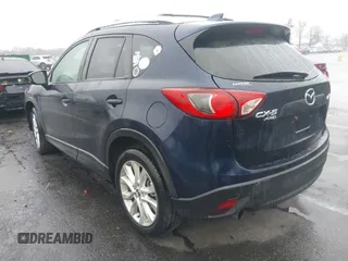2014 Mazda CX-5 Grand Touring with VIN JM3KE4DY8E0366644, listed as a IAAI auction lot 41971438 with 135,644 mi miles and . Bid and sale history available at carsss.com. Image 3.