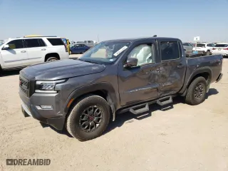 2022 Nissan Frontier PRO-X with VIN 1N6ED1EJ4NN687038, listed as a Copart auction lot 74777834 with 2,180 mi miles and Salvage Title. Bid and sale history available at carsss.com. Image 1.