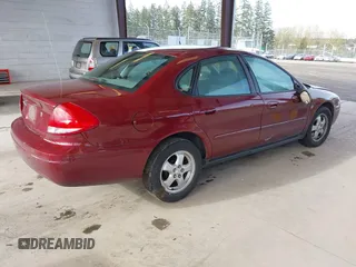 2004 Ford Taurus SES with VIN 1FAFP55S94G161852, listed as a IAAI auction lot 41933231 with 81,536 mi miles and . Bid and sale history available at DreamBid. Image 4.