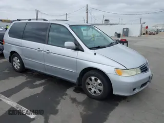 2003 Honda Odyssey EX-L with VIN 5FNRL18943B030373, listed as a IAAI auction lot 41867289 with 179,718 mi miles and . Bid and sale history available at DreamBid. Image 1.