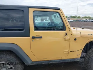 2014 Jeep Wrangler Rubicon with VIN 1C4BJWCG4EL145081, listed as a IAAI auction lot 42180723 with 113,659 mi miles and . Bid and sale history available at DreamBid. Image 13.