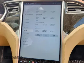 2013 Tesla Model S with VIN 5YJSA1CG5DFP03704, listed as a Copart auction lot 65143565 with Not provided miles and Clean title. Bid and sale history available at DreamBid. Image 9.