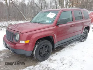 2015 Jeep Patriot Sport with VIN 1C4NJPBA4FD313006, listed as a IAAI auction lot 41536772 with 148,914 mi miles. Bid and sale history available at carsss.com. Image 2.