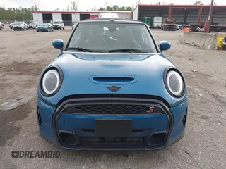 2022 MINI Convertible Cooper S z VIN WMW43DL06N3P19784, wystawiony jako IAAI lot #42635816 z przebiegiem 17 053 mil mil oraz . Historia ofert i sprzedaży dostępna na DreamBid. Obrazek 13.