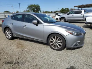 2014 Mazda 3 S Grand Touring with VIN JM1BM1W33E1176840, listed as a Copart auction lot 52888225 with 101,861 mi miles and Salvage Title. Bid and sale history available at DreamBid. Image 4.