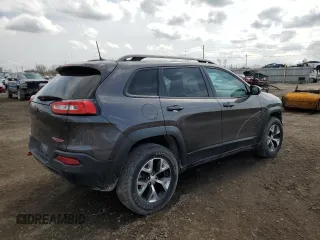 2018 Jeep Cherokee Trailhawk with VIN 1C4PJMBB0JD561309, listed as a Copart auction lot 51487065 with 105,138 mi miles and Salvage title. Bid and sale history available at DreamBid. Image 3.