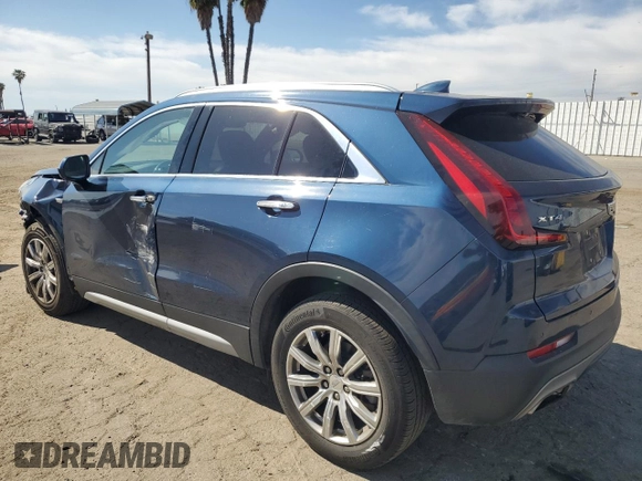2019 Cadillac XT4 FWD Premium Luxury with VIN 1GYFZCR42KF104457, listed as a Copart auction lot 52783485 with 57,572 mi miles and Salvage title. Bid and sale history available at DreamBid. Image 2.