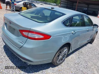 2013 Ford Fusion SE Hybrid z VIN 3FA6P0LU4DR259073, wystawiony jako IAAI lot #42197143 z przebiegiem 87 337 mil mil oraz . Historia ofert i sprzedaży dostępna na DreamBid. Obrazek 4.