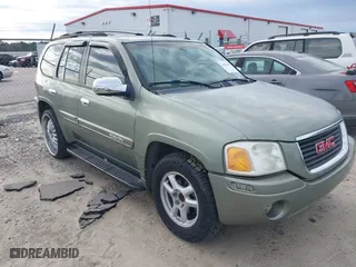 2004 GMC Envoy SLE with VIN 1GKDS13S442240682, listed as a IAAI auction lot 41764185 with 139,348 mi miles. Bid and sale history available at carsss.com. Image 1.