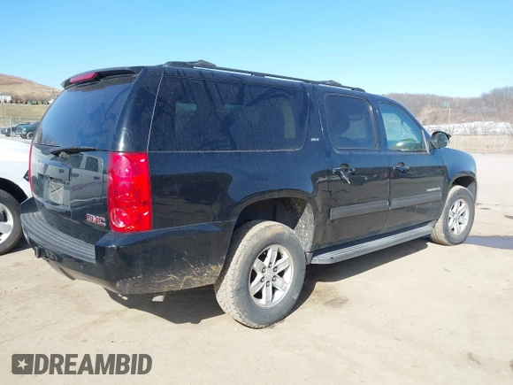 2014 GMC Yukon XL SLT with VIN 1GKS2KE79ER238831, listed as a IAAI auction lot 41767472 with 284,596 mi miles. Bid and sale history available at carsss.com. Image 4.
