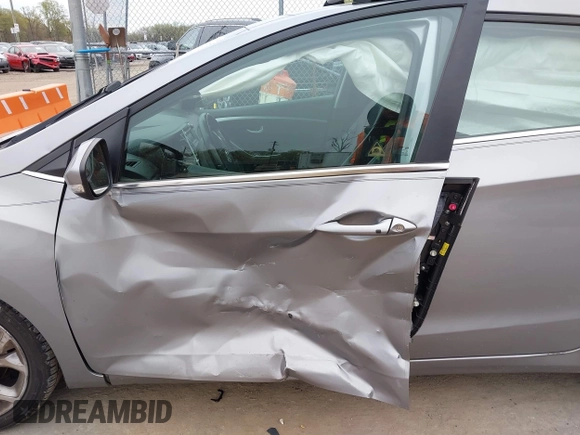 2014 Hyundai Elantra GT with VIN KMHD35LH6EU165019, listed as a IAAI auction lot 42016057 with 121,794 mi miles. Bid and sale history available at carsss.com. Image 6.