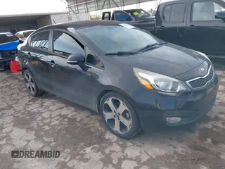 2013 Kia Rio EX with VIN KNADN4A33D6206917, listed as a IAAI auction lot 41049490 with 188,281 mi miles and . Bid and sale history available at DreamBid. Image 1.