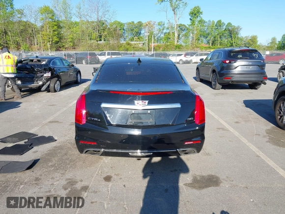 2015 Cadillac CTS Premium AWD with VIN 1G6AZ5S35F0129572, listed as a IAAI auction lot 42045670 with 62,758 mi miles and . Bid and sale history available at DreamBid. Image 16.
