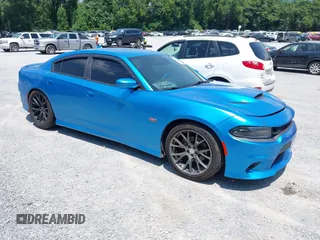 2015 Dodge Charger SXT with VIN 2C3CDXHG9FH837074, listed as a IAAI auction lot 42549264 with 150,068 mi miles and . Bid and sale history available at DreamBid. Image 1.