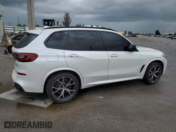 2021 BMW X5 sDrive40i with VIN 5UXCR4C01M9H47230, listed as a Copart auction lot 59798464 with 36,975 mi miles and Salvage title. Bid and sale history available at DreamBid. Image 3.