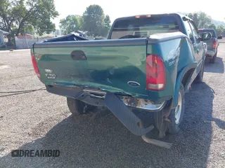 1999 Ford F-150 with VIN 1FTRX18W4XNA50527, listed as a IAAI auction lot 42563746 with 213,959 mi miles and . Bid and sale history available at DreamBid. Image 6.
